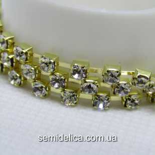 Стразовая цепь SS8 2.5мм, золото с прозрачным камнем
